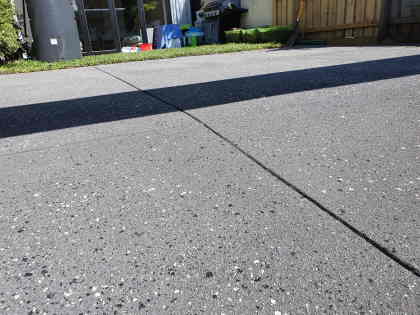 Spray on concrete close up photo after finishing job on Wollongong driveway.